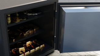 gold coins and bars and silver coins and bars in safe symbolizing 401(k) rollover to gold ira