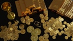 lots of gold coins and gold bullion showing how gold is a time tested asset