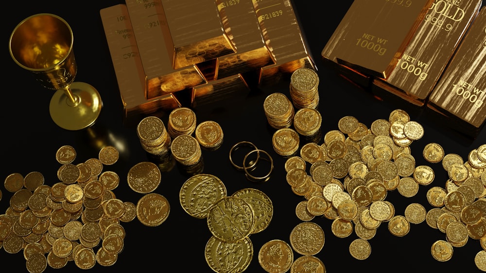 a table topped with lots of gold coins