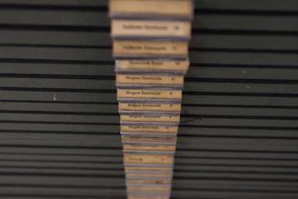 A sleek display of multiple international certifications arranged on a dark green panel.