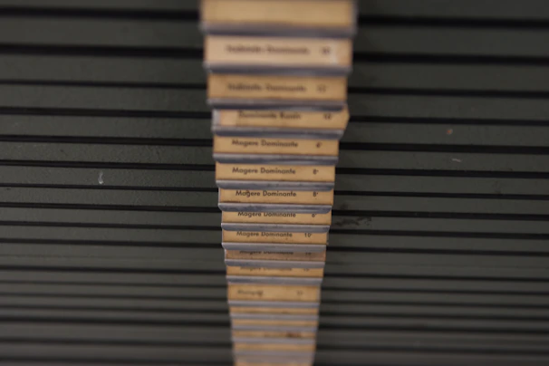 A sleek display of multiple international certifications arranged on a dark green panel.