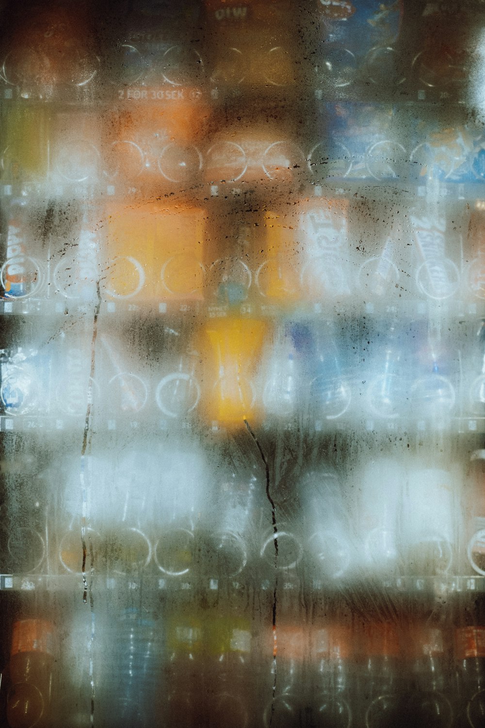 a close up of a window with rain drops