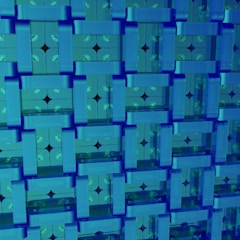 Dark graphite abstract geometric pattern with faint blockchain lines and subtle navy highlights.