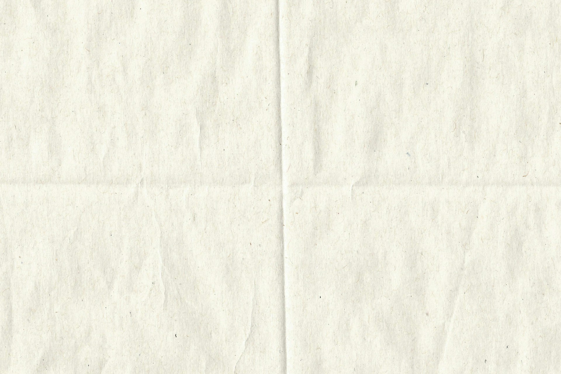 a piece of white paper that has been folded