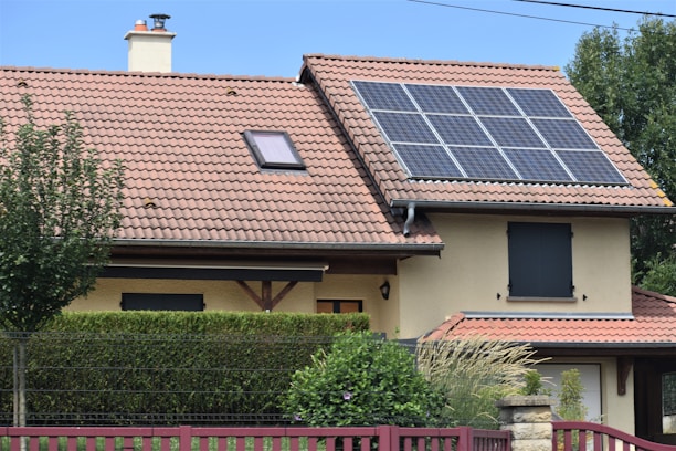 a house with a solar panel on the roof