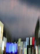 Abstract digital art blending dark cityscapes with glitch effects.