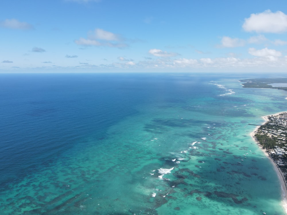 an aerial view of a beach and ocean