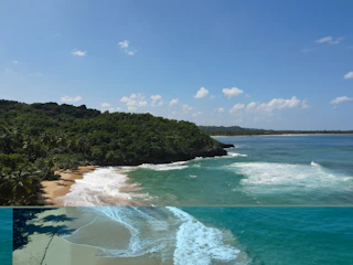 A scenic beach with turquoise waters and golden sand under a clear sky.