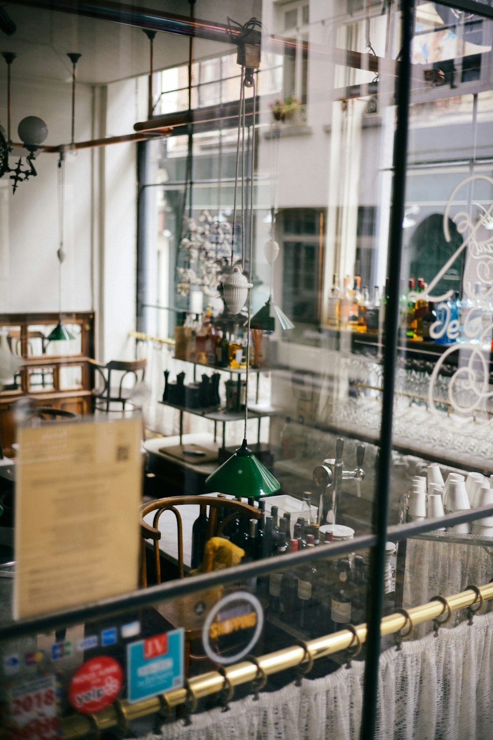 a store front with a lot of items in the window