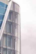 a very tall building with a clock on it's side