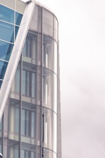a very tall building with a clock on it's side