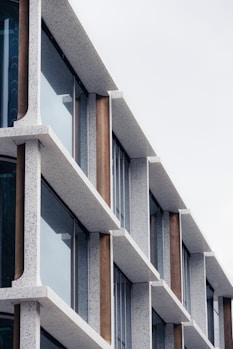 a tall building with multiple balconies and windows