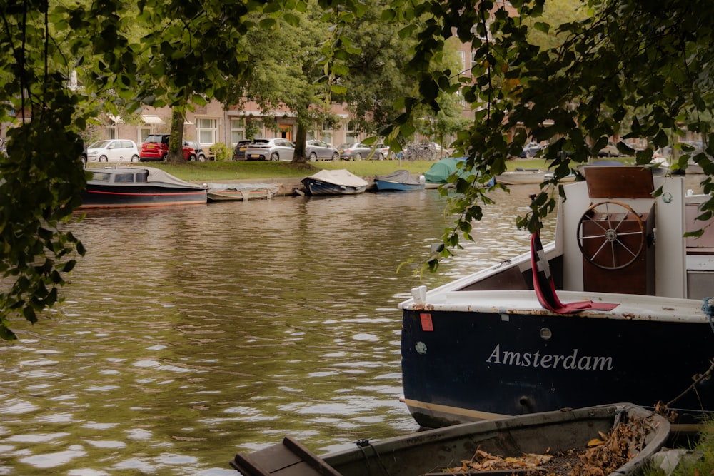 a couple of boats that are sitting in the water