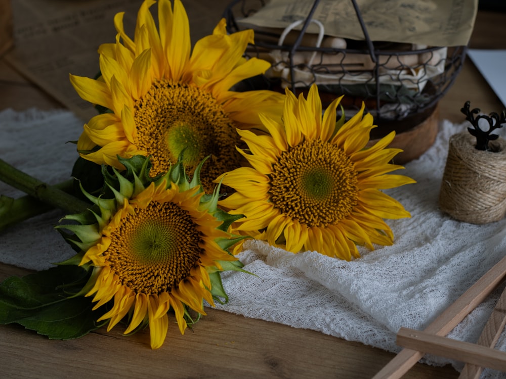 a bunch of sunflowers sitting on a table