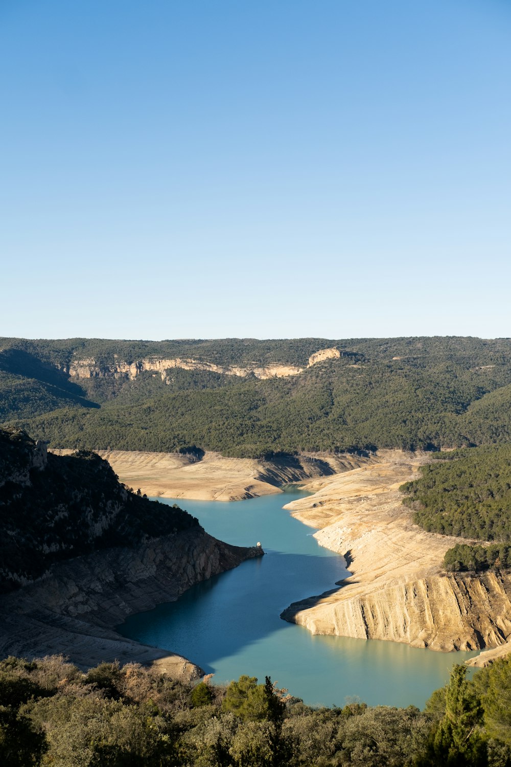 a large body of water surrounded by mountains