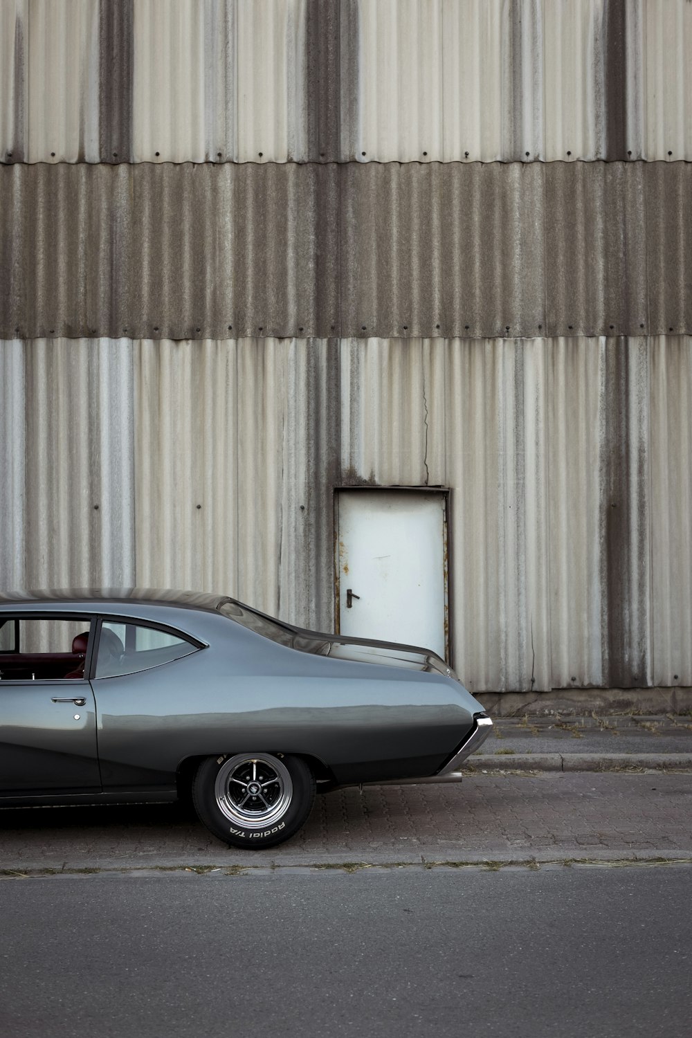 a car parked in front of a building