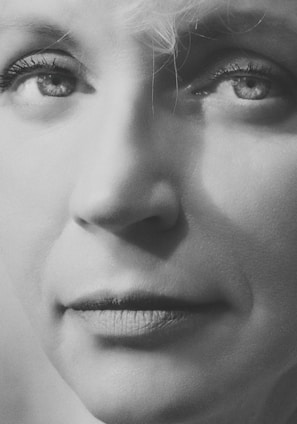 An intimate black-and-white portrait reflecting genuine emotion and depth.