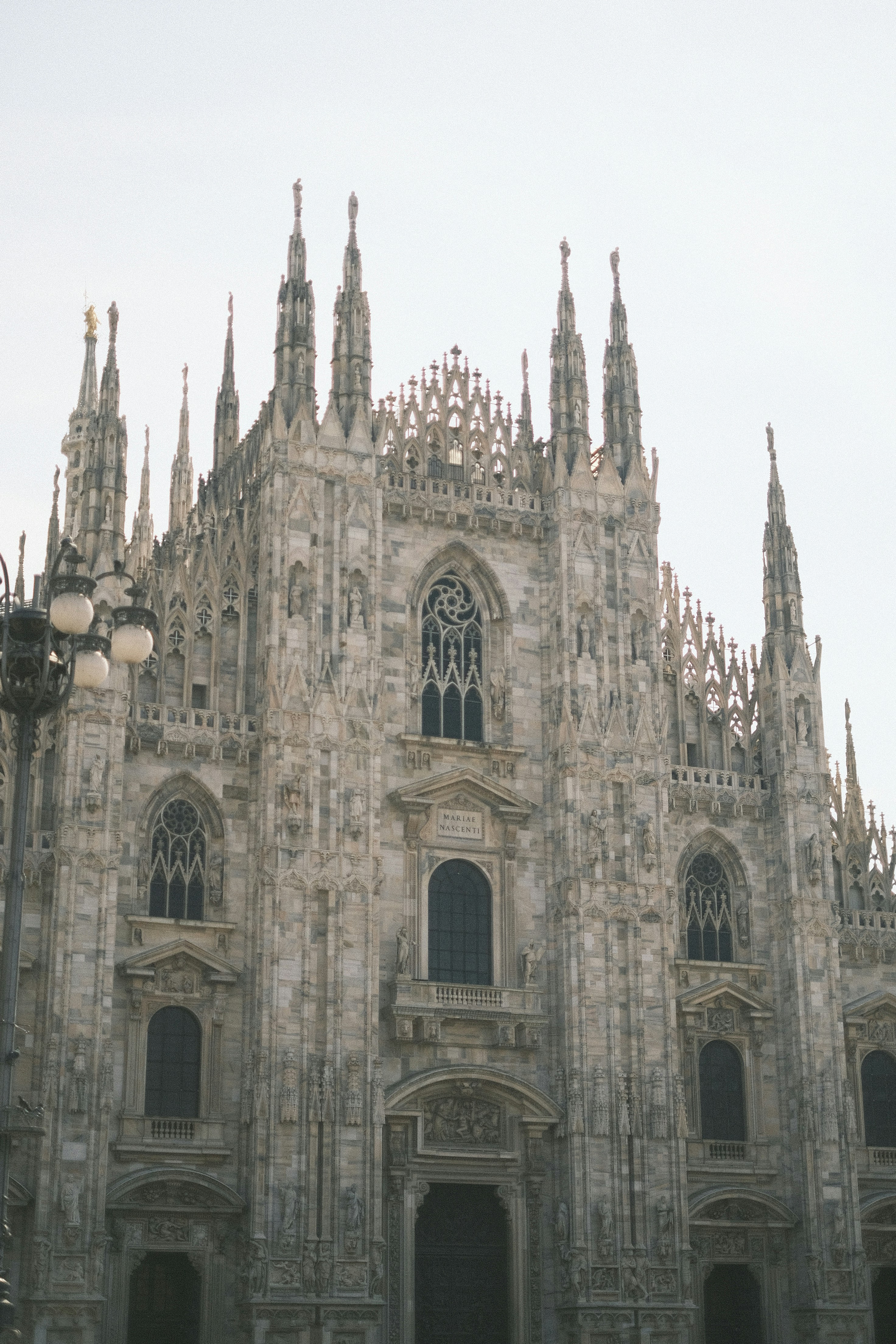 a large building with a clock on the front of it