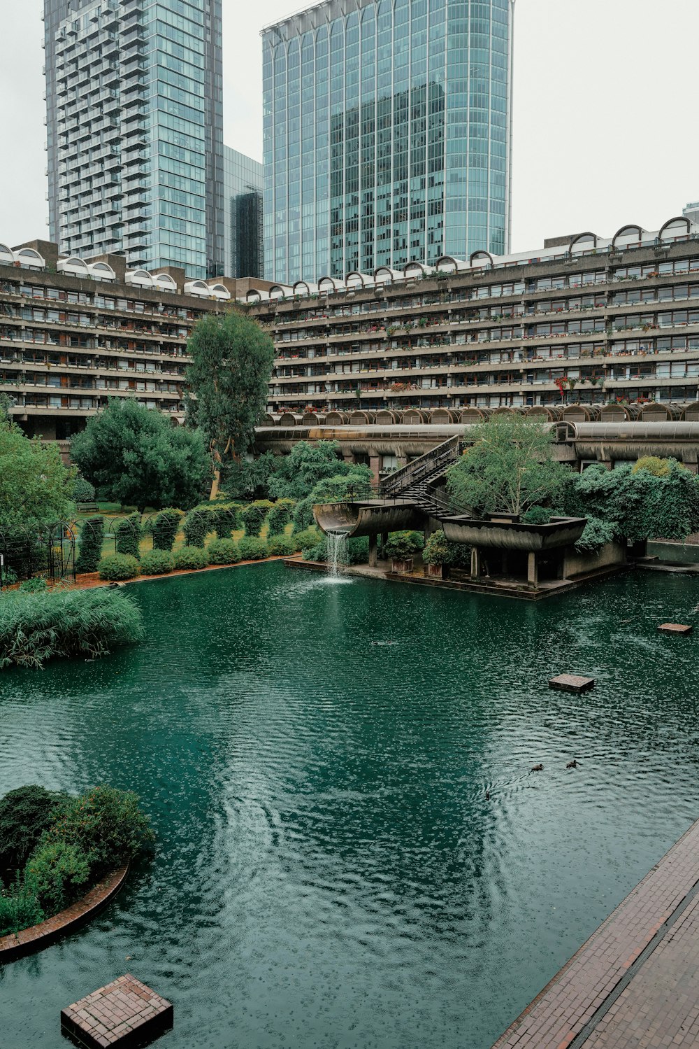 a large body of water surrounded by tall buildings