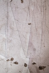 Before image of a commercial VCT floor looking dull and scratched.