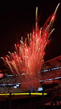 An image capturing a special in-game event with colorful fireworks and player celebrations.