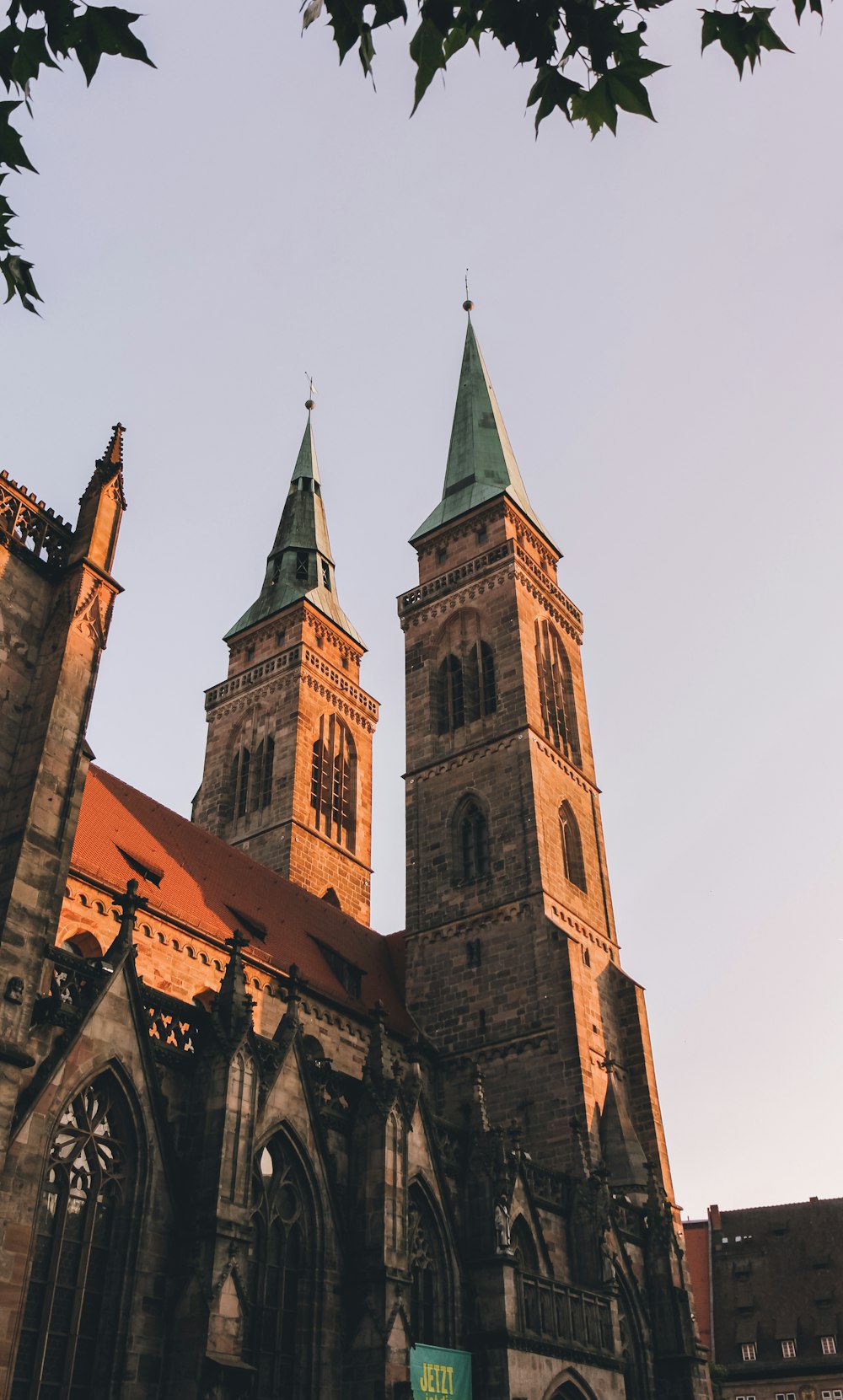 a large cathedral with two towers and a clock