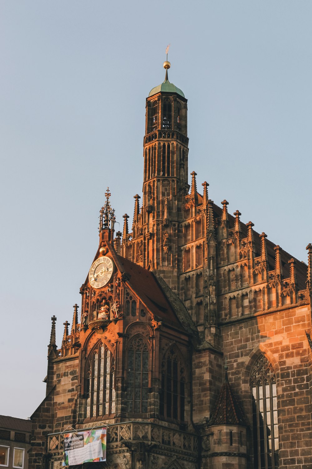 a large building with a clock on the front of it