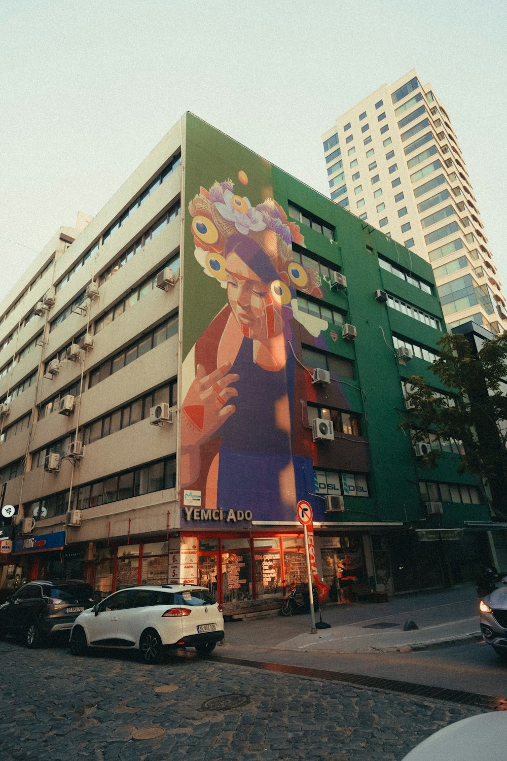 a large building with a mural on the side of it