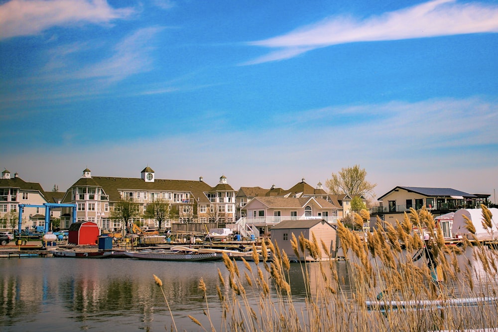 a body of water with a bunch of houses in the background