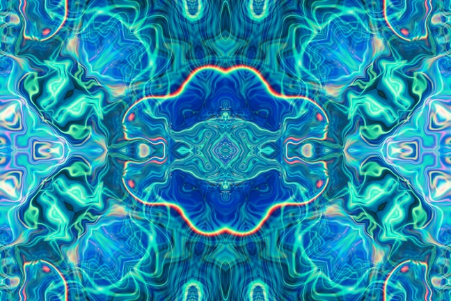 A vibrant kaleidoscope pattern with swirling blues and purples saved on a digital screen.