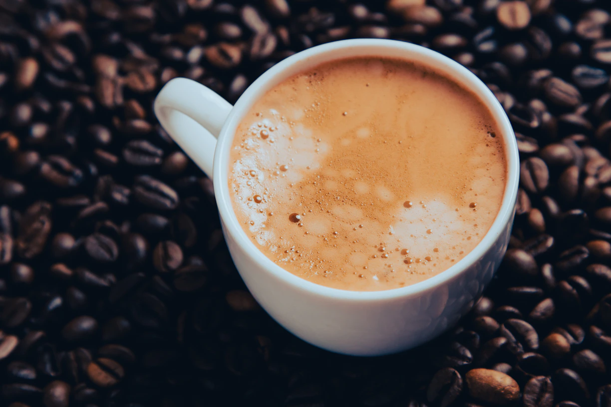 Elegant coffee cup showcasing rich crema on freshly brewed Indian coffee.
