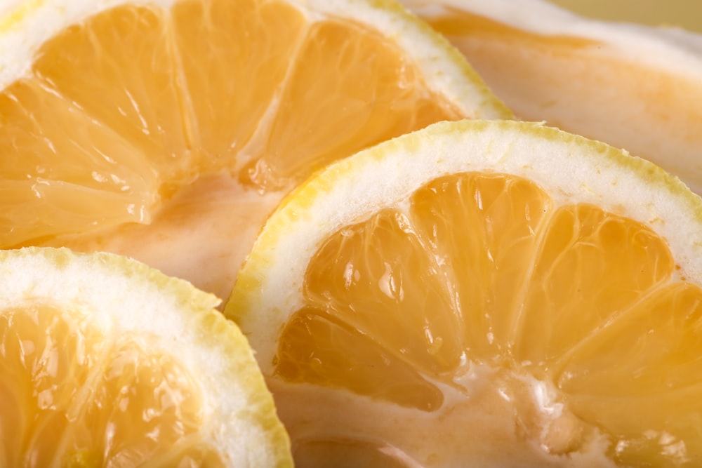 a close up of sliced oranges on a table
