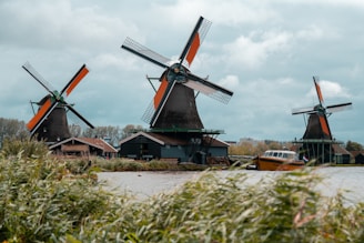 a group of windmills sitting next to each other
