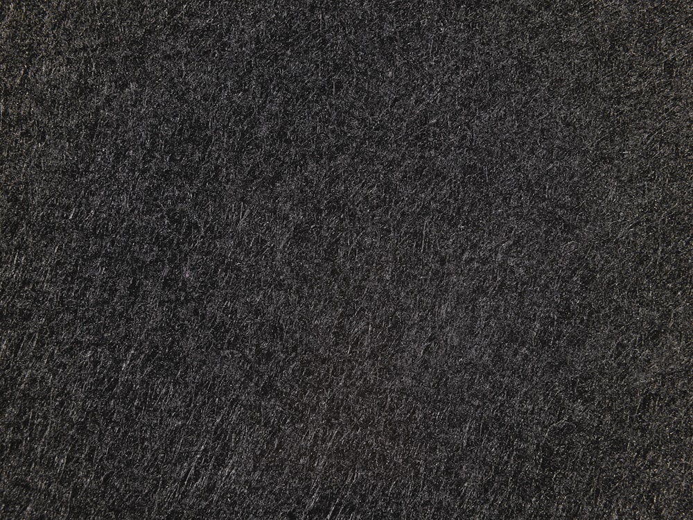 a close up of a black textured surface