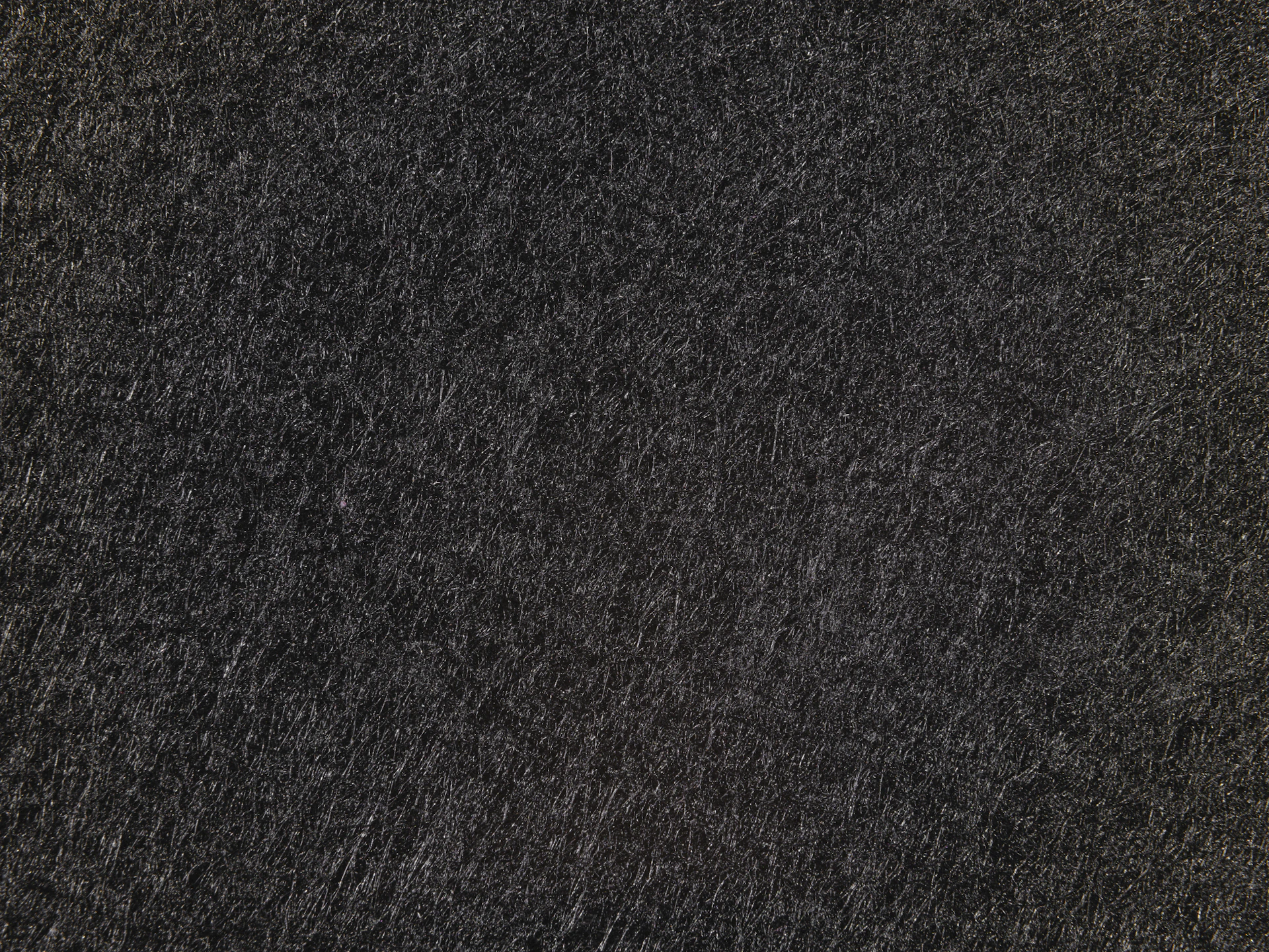 a close up of a black textured surface