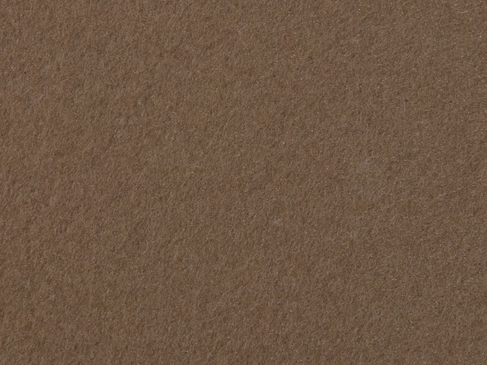 a close up of a brown paper texture