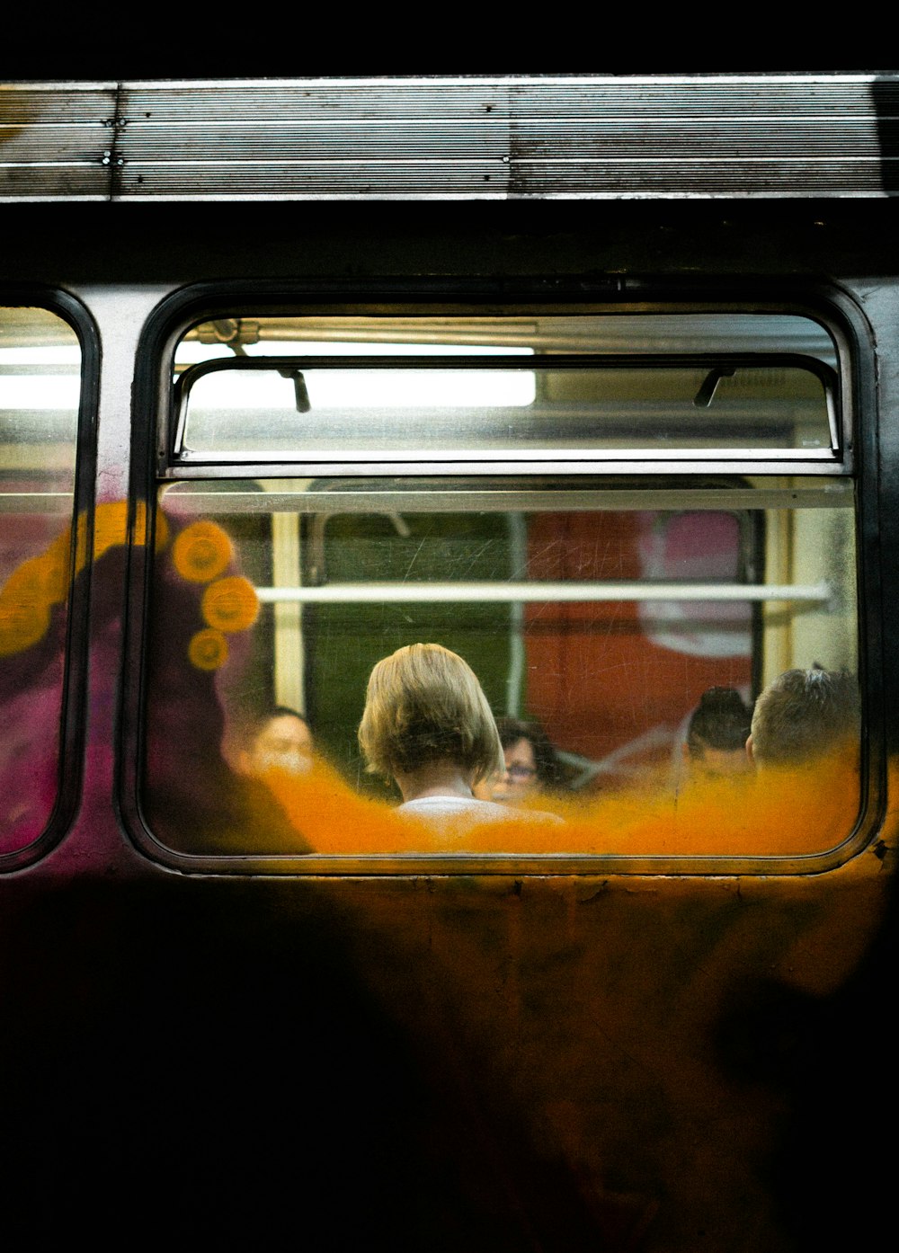 a view of the inside of a subway car