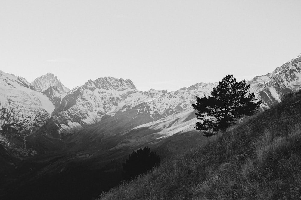 a black and white photo of a mountain range