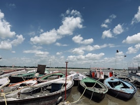 a bunch of boats that are sitting in the water