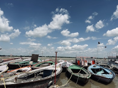 a bunch of boats that are sitting in the water