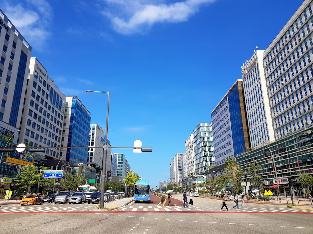 a city street filled with lots of tall buildings