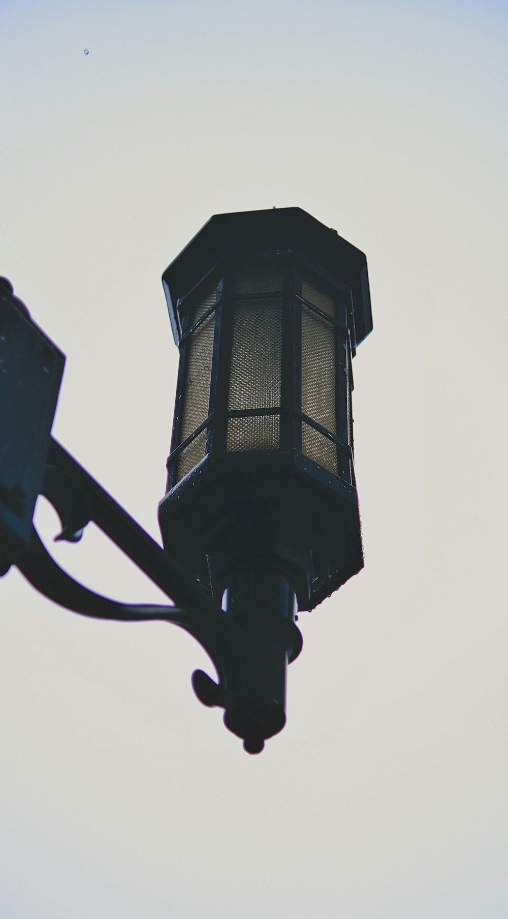 a street light with a clear sky in the background