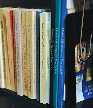 a book shelf with a bunch of books on it