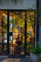 Warm, inviting flower shop interior with cream and gold accents and fresh bouquets.