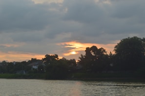 A serene landscape at sunset, capturing the fleeting beauty of a moment.