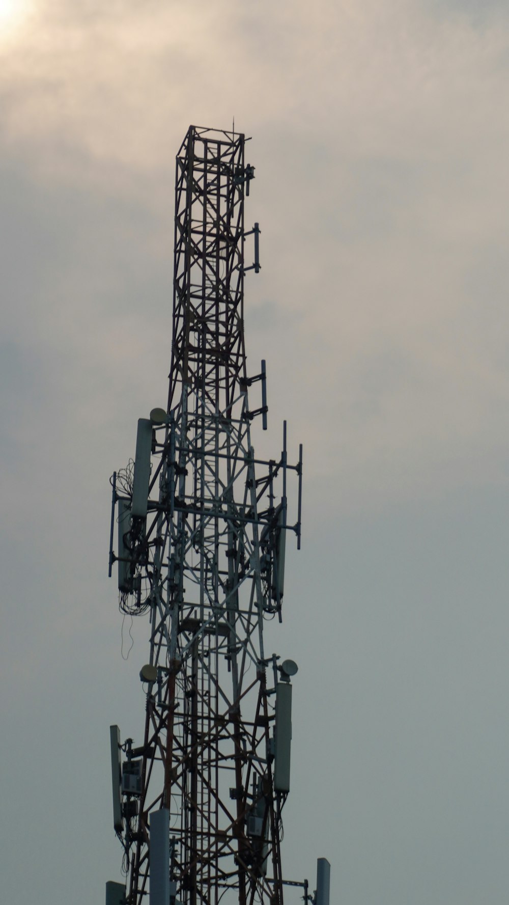 a very tall tower with a lot of antennas on top of it