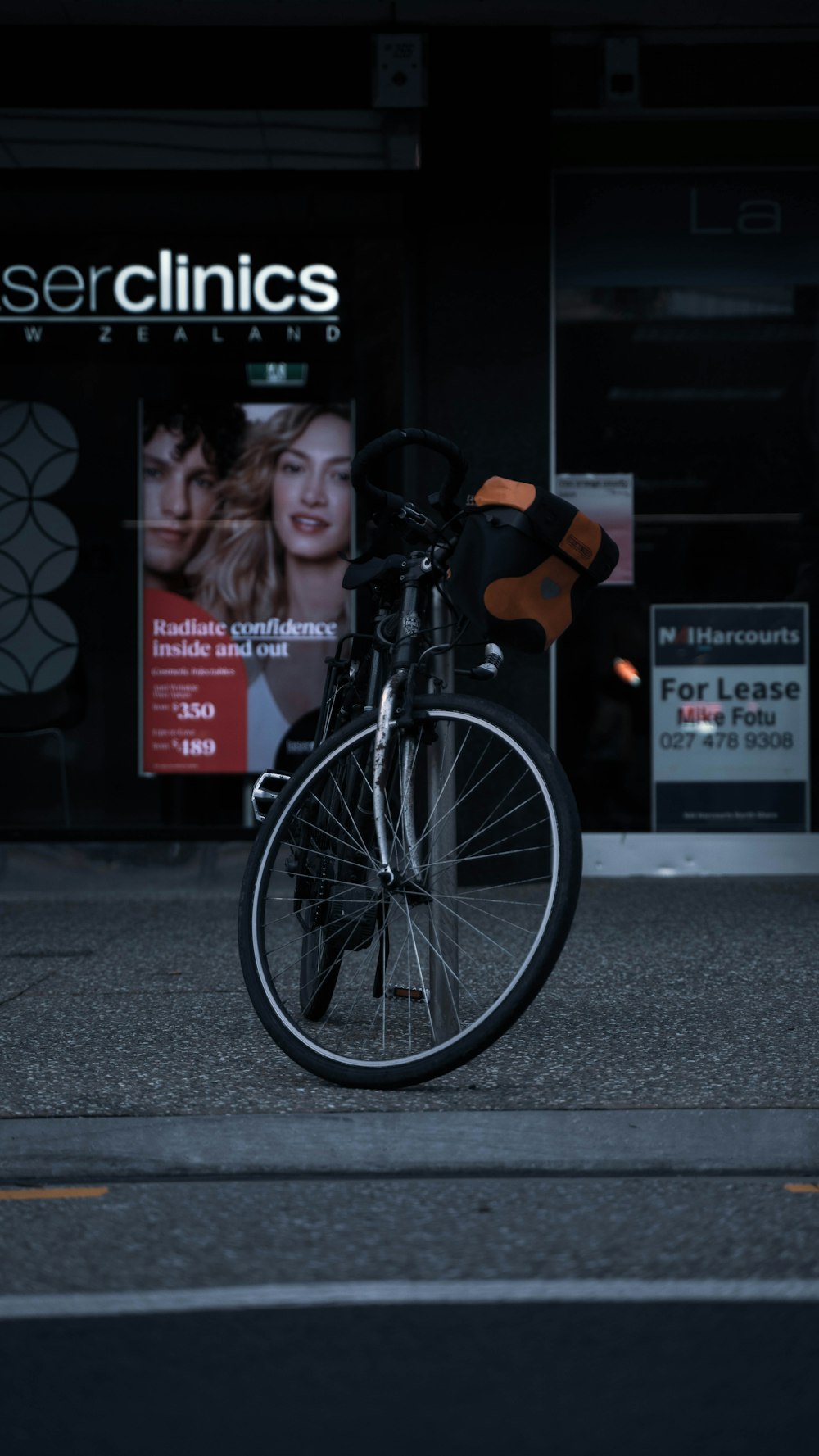 a bicycle parked on the side of the road