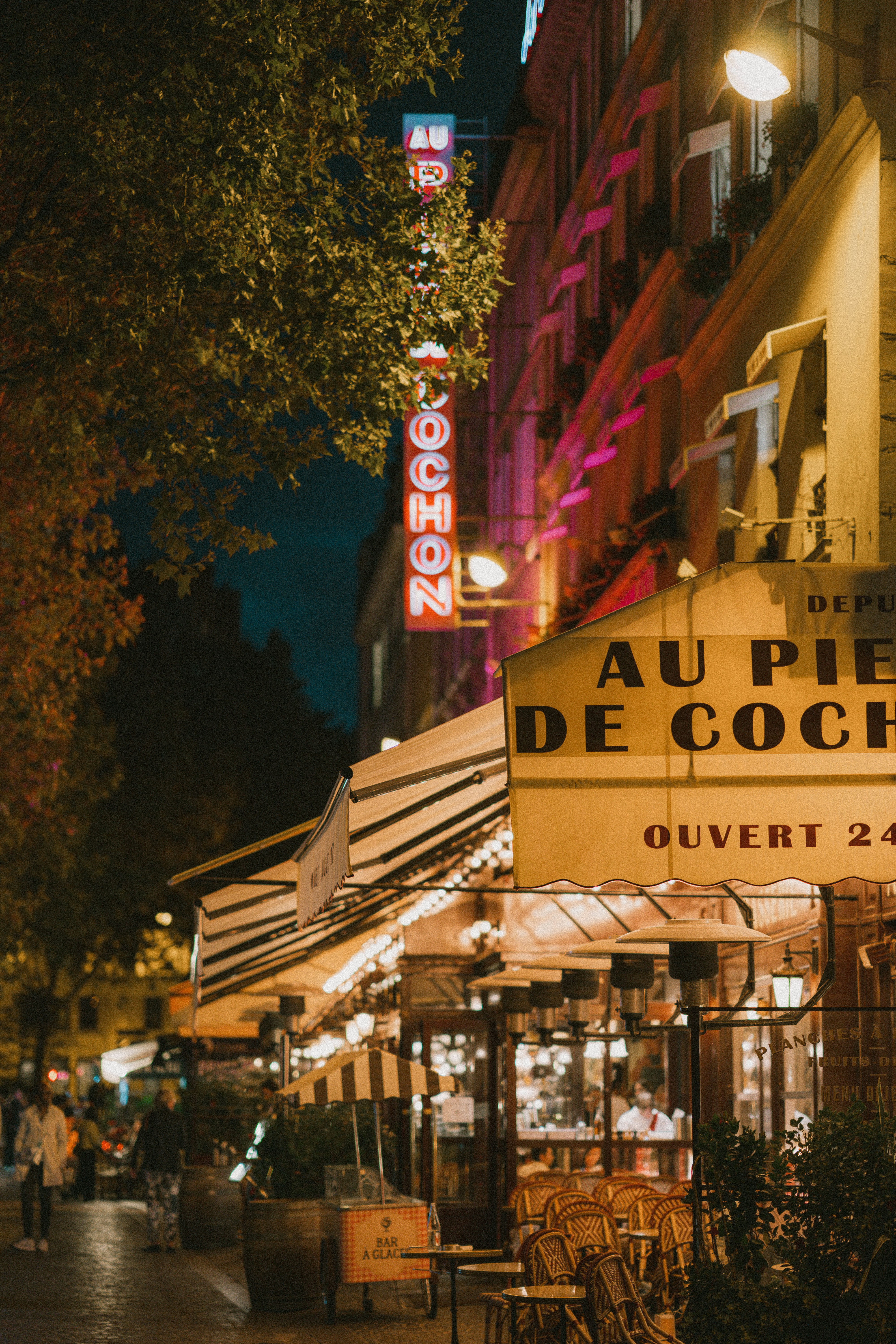 a restaurant with a sign on the front of it