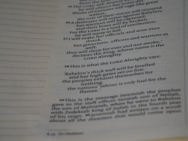 A close-up image of a page from a book, featuring religious or biblical text. The page contains specifically numbered sections and is printed in two columns. The text appears focused on religious prophecy and warnings.