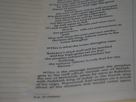 A close-up image of a page from a book, featuring religious or biblical text. The page contains specifically numbered sections and is printed in two columns. The text appears focused on religious prophecy and warnings.